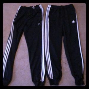 2 pairs of men’s Small adidas pants.